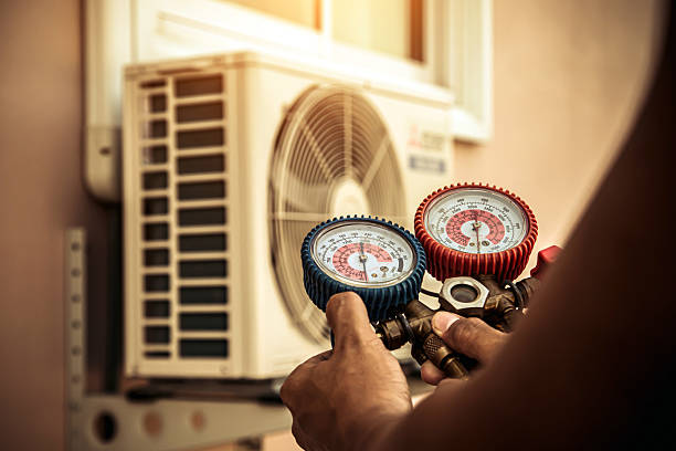 Professional Hvac technician working in Portales, NM